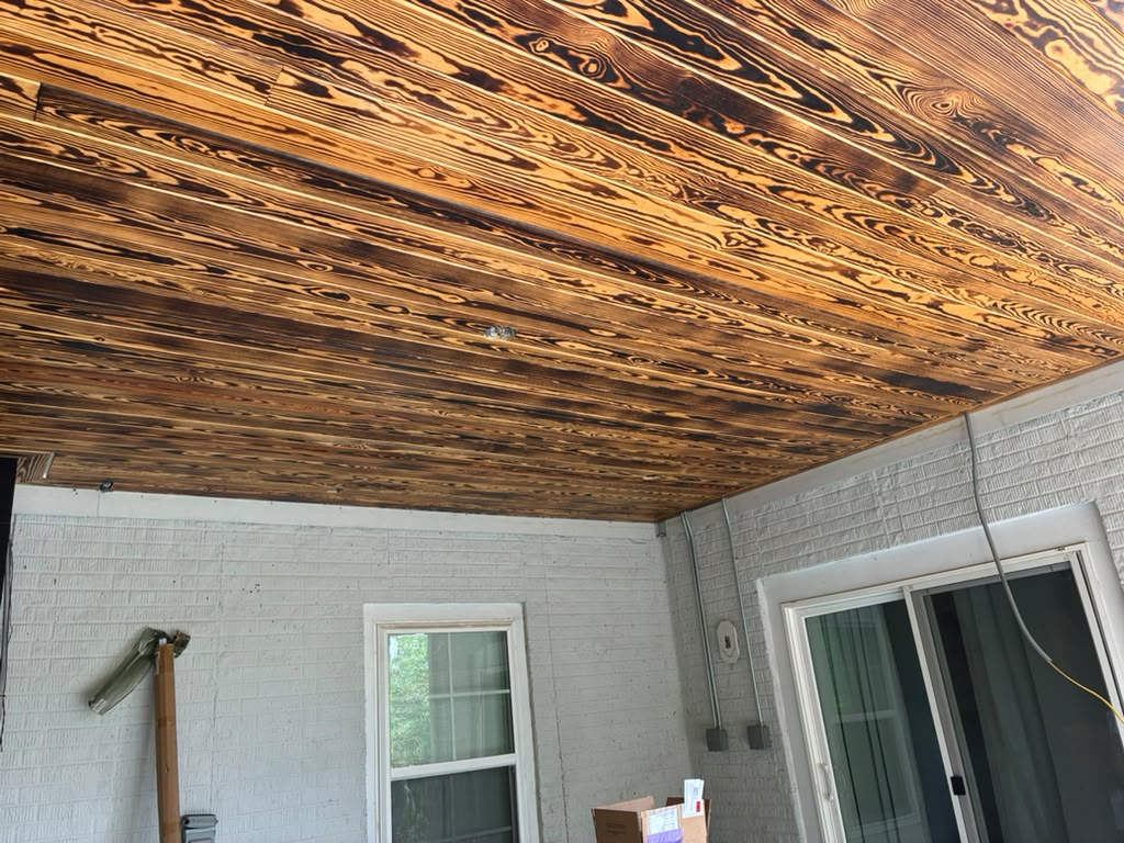 Finished wood ceiling surface