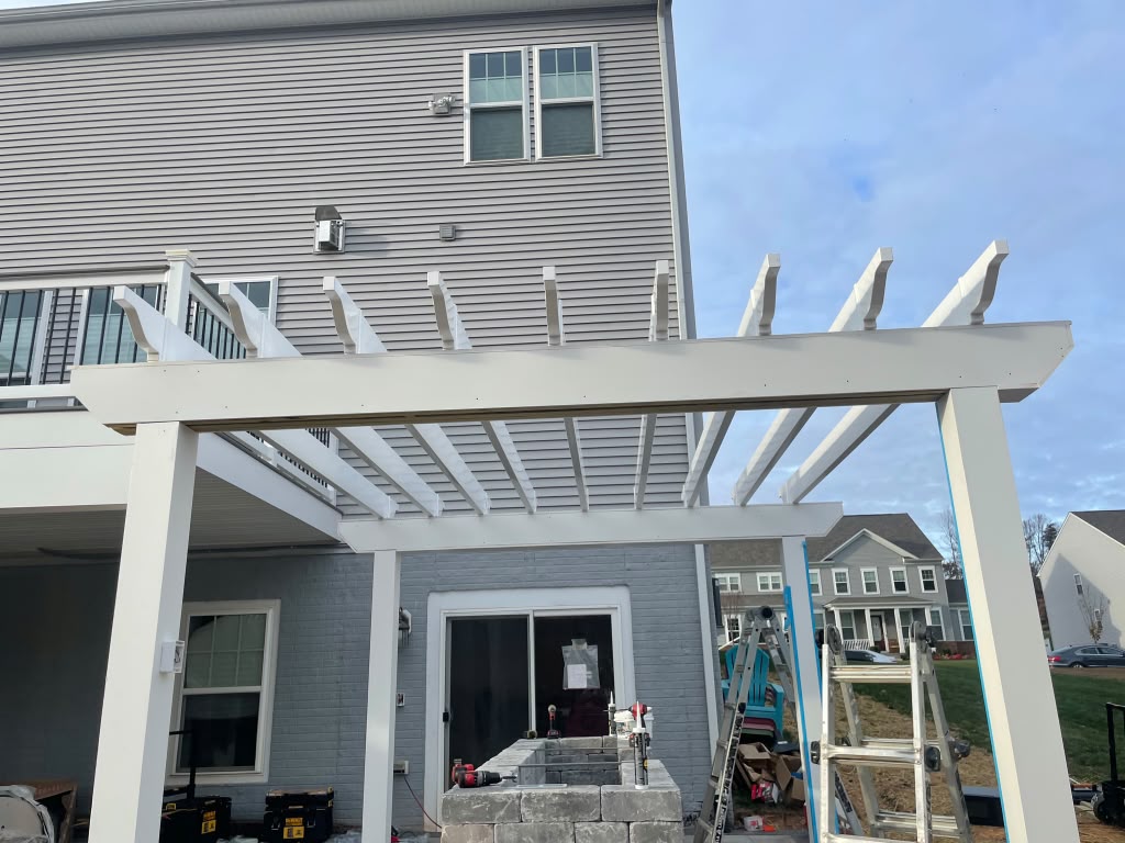 Timber outdoor structure beside a deck